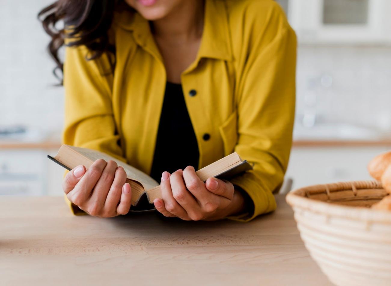Business professional reviewing financial documents and charts